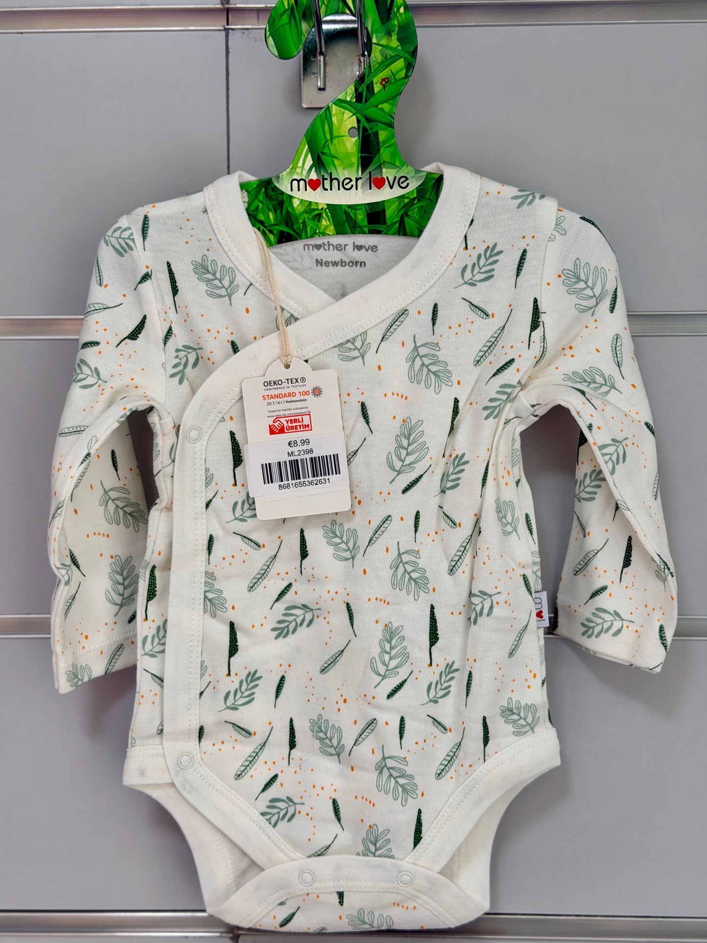 Wrap Romper – White with Green Leaf Print